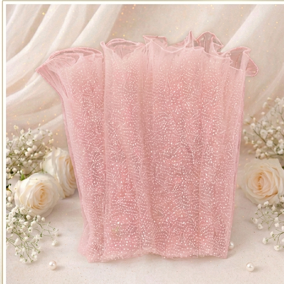 Pink lace top with floral decorations on a soft background

